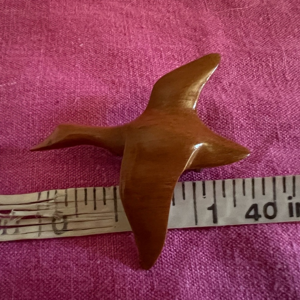 Gorgeous little flying duck pin - signed by artist - made of carved wood